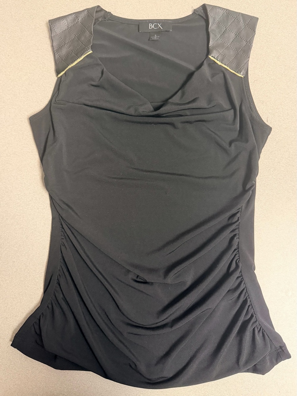 BCX Black Sleeveless Draped Top with Quilted Shoulders and Gold Trim